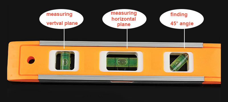 There is a spirit level with three bubble level vials.